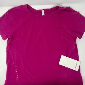 NWT Lululemon lightweight stretch run short sleeve shirt. Size 8. Magenta.
